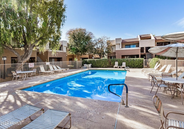 view of pool featuring a patio area