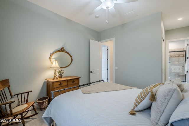 bedroom featuring connected bathroom and ceiling fan