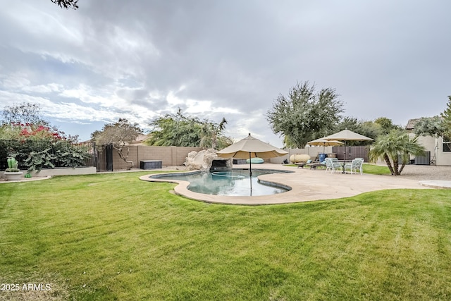 view of swimming pool featuring a yard, central AC, and a patio area