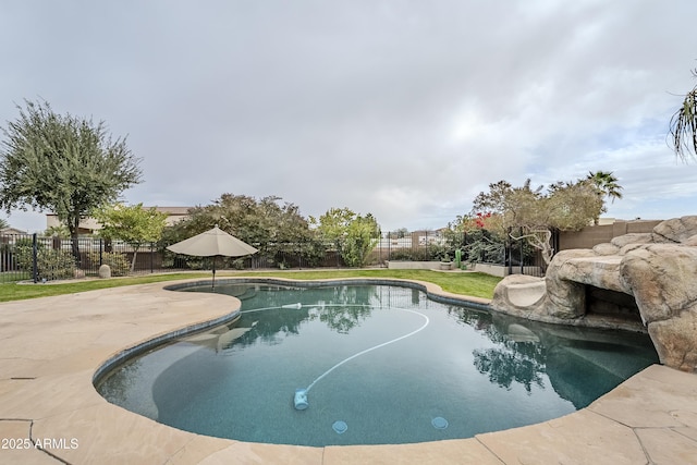 view of swimming pool featuring a patio area