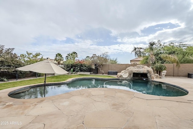 view of swimming pool featuring a patio area