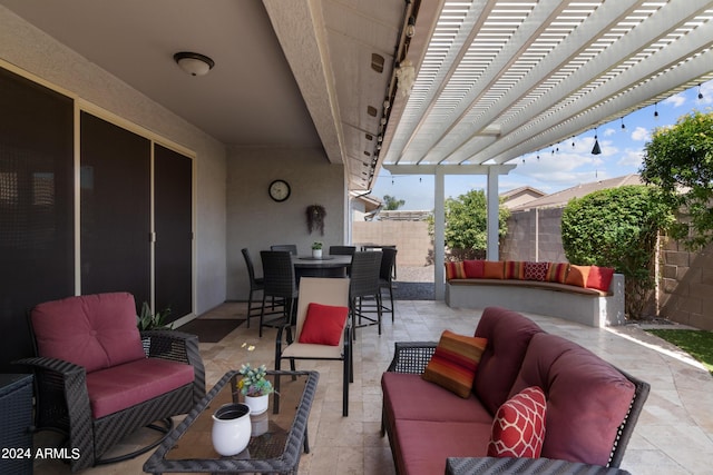 view of patio / terrace featuring an outdoor living space and a pergola