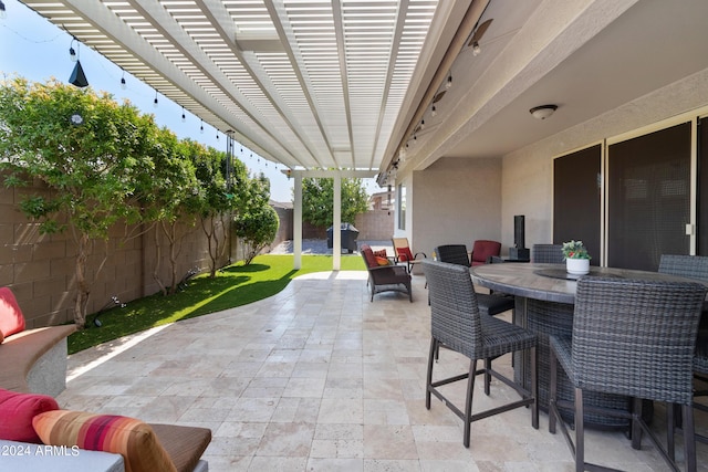 view of patio with a pergola and a grill