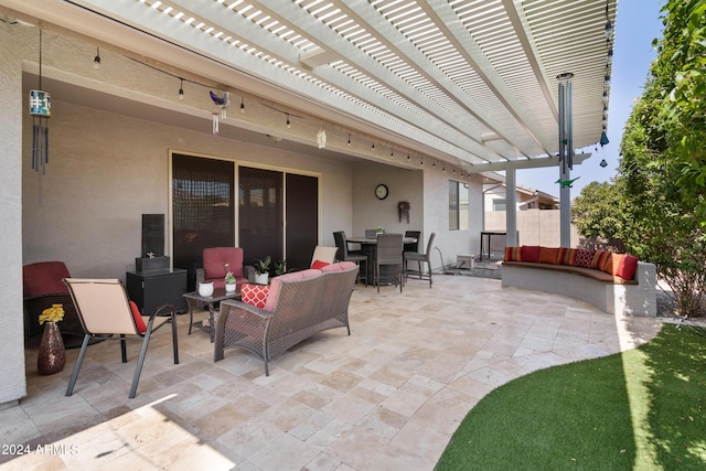 view of patio featuring outdoor lounge area and a pergola