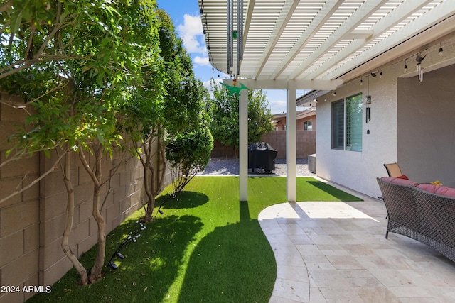 view of yard featuring a patio and a pergola