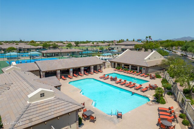 view of swimming pool with a patio area