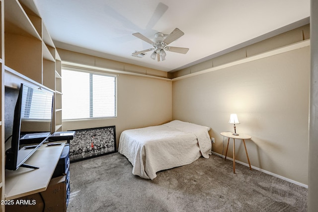 bedroom featuring carpet flooring, visible vents, a ceiling fan, and baseboards