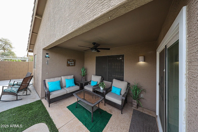 view of patio / terrace with outdoor lounge area, ceiling fan, and fence