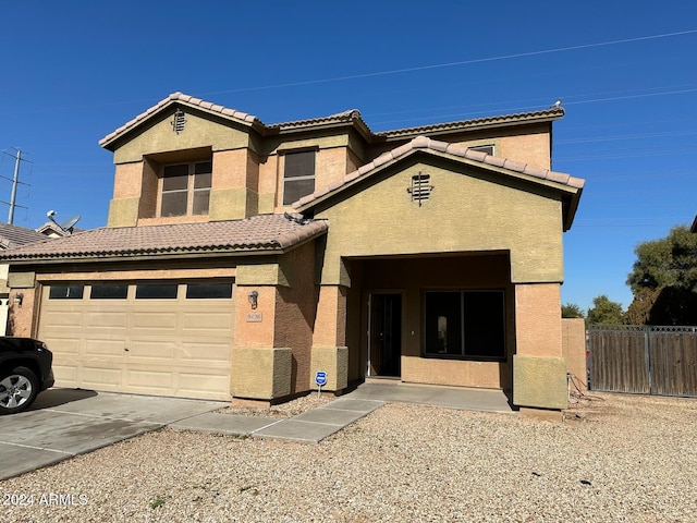 view of front of property featuring a garage