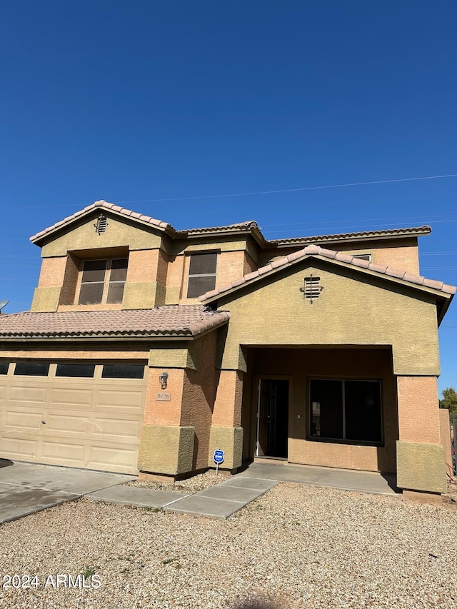 view of front of house with a garage