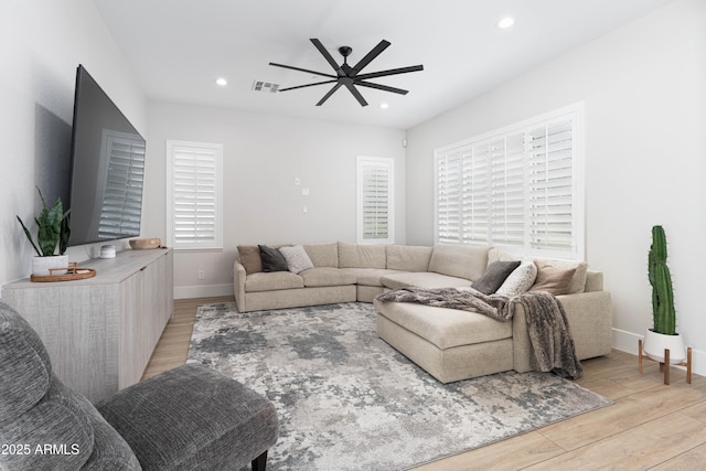 3356 E Vallejo Ct, Gilbert, AZ 85298 - living area with recessed lighting, ceiling fan, visible vents, light wood-style flooring, and baseboards