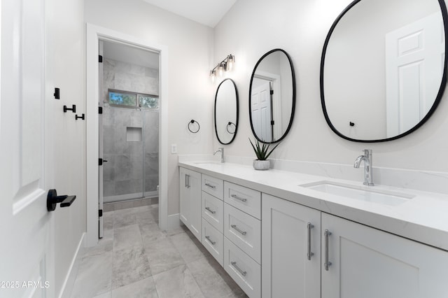 3356 E Vallejo Ct, Gilbert, AZ 85298 - full bathroom with double vanity, marble finish floor, a sink, baseboards, and a stall shower