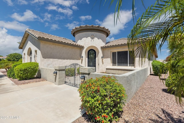 3356 E Vallejo Ct, Gilbert, AZ 85298 - mediterranean / spanish-style home featuring fence, stucco siding, and a tiled roof