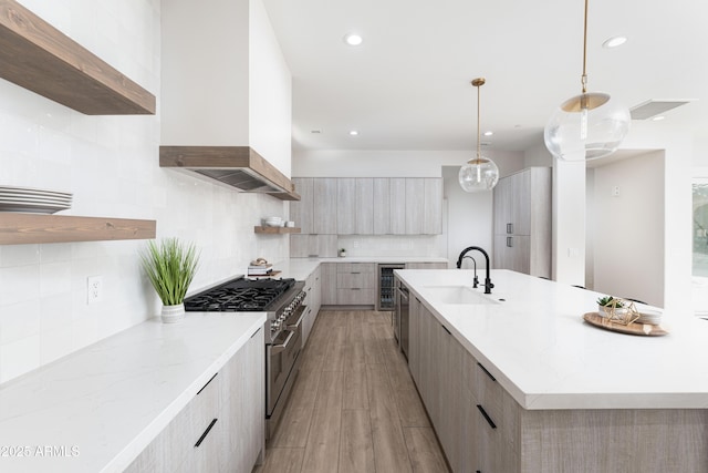 3356 E Vallejo Ct, Gilbert, AZ 85298 - kitchen with double oven range, decorative backsplash, a sink, recessed lighting, and modern cabinets