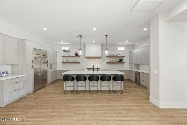 3356 E Vallejo Ct, Gilbert, AZ 85298 - kitchen with a breakfast bar, modern cabinets, open shelves, and stainless steel built in refrigerator