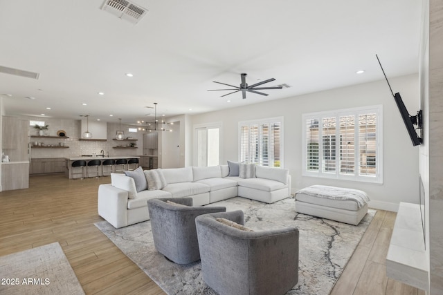 3356 E Vallejo Ct, Gilbert, AZ 85298 - living room with visible vents, ceiling fan, recessed lighting, and light wood-style floors