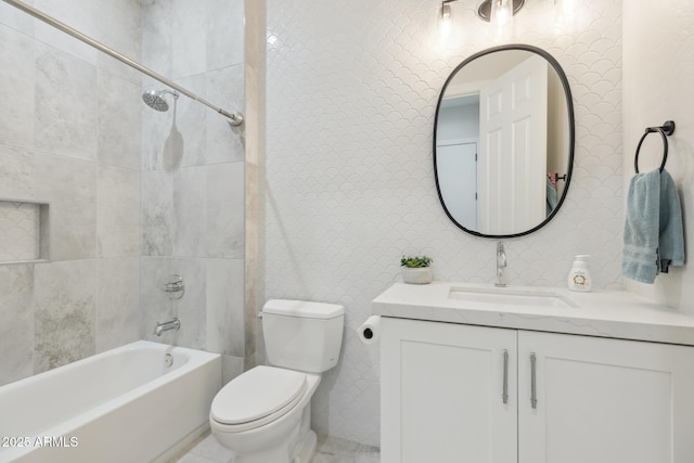 3356 E Vallejo Ct, Gilbert, AZ 85298 - full bathroom with tile walls, vanity, toilet, and bathing tub / shower combination