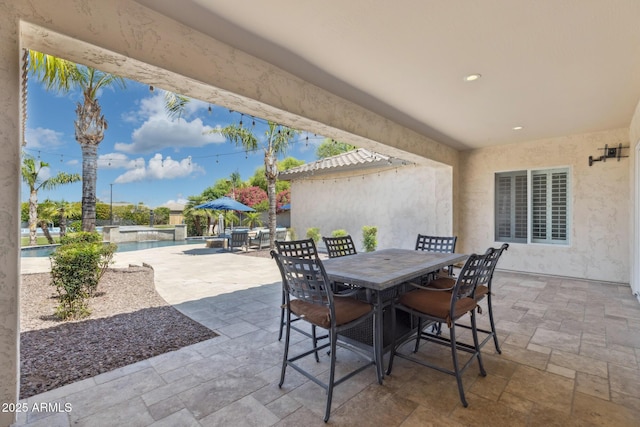 3356 E Vallejo Ct, Gilbert, AZ 85298 - view of patio / terrace featuring outdoor dining space and an outdoor pool