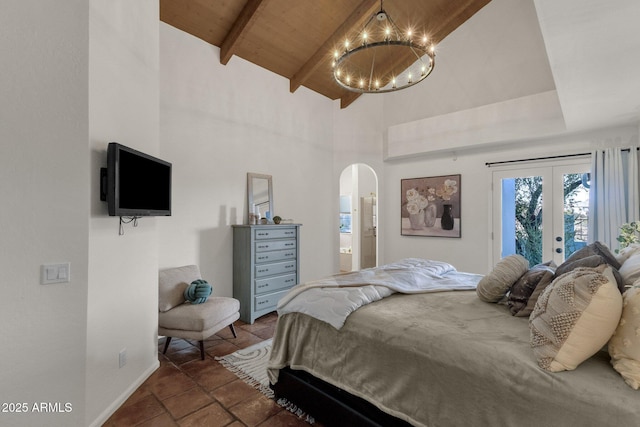 bedroom with french doors, access to outside, beam ceiling, wooden ceiling, and a notable chandelier