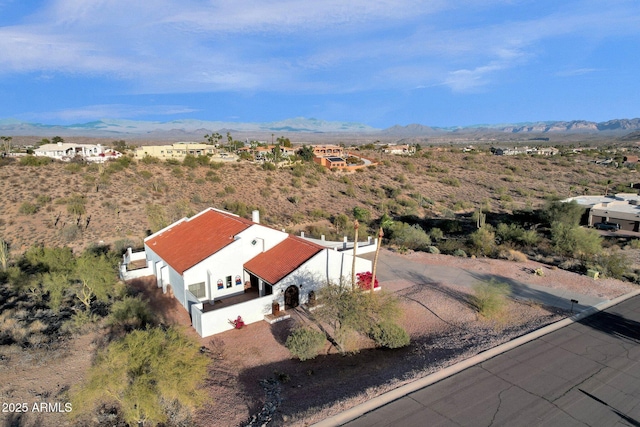 aerial view featuring a mountain view