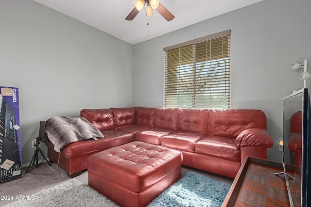 living room with carpet and ceiling fan