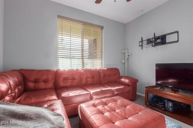 living room featuring carpet flooring and ceiling fan