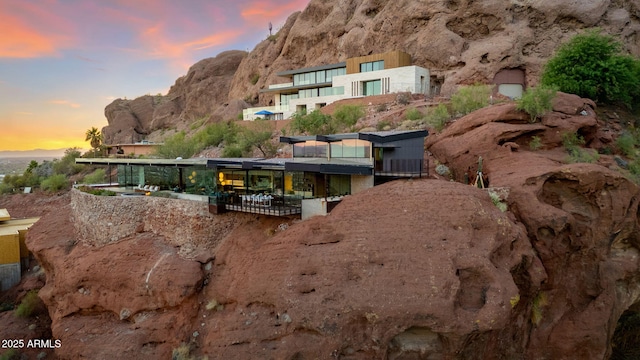 4925 E Red Rock Dr Unit 43, Phoenix, AZ 85018 - back of house at dusk featuring a mountain view