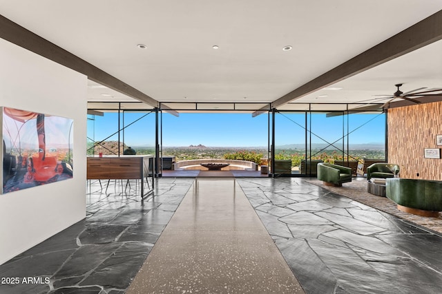 4925 E Red Rock Dr Unit 43, Phoenix, AZ 85018 - sunroom featuring ceiling fan, a mountain view, and beamed ceiling