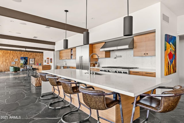 4925 E Red Rock Dr Unit 43, Phoenix, AZ 85018 - kitchen with dark marble finish flooring, modern cabinets, wall chimney exhaust hood, backsplash, and light countertops