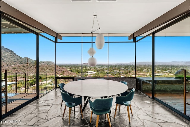 4925 E Red Rock Dr Unit 43, Phoenix, AZ 85018 - sunroom with a wall of windows, a mountain view, and marble finish flooring