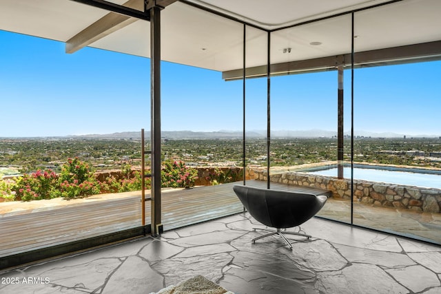 4925 E Red Rock Dr Unit 43, Phoenix, AZ 85018 - unfurnished sunroom with a mountain view