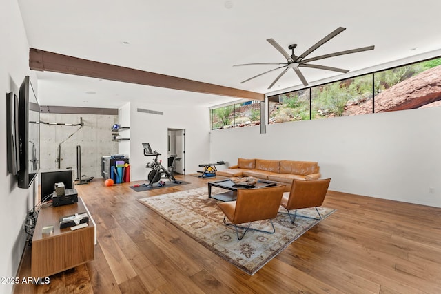 4925 E Red Rock Dr Unit 43, Phoenix, AZ 85018 - living room with a ceiling fan, hardwood / wood-style flooring, healthy amount of natural light, and beam ceiling