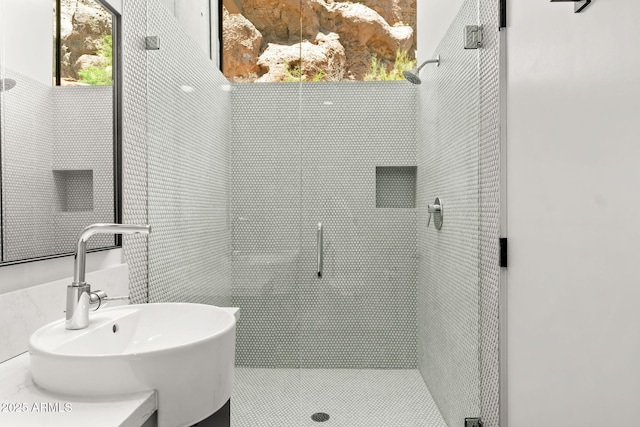4925 E Red Rock Dr Unit 43, Phoenix, AZ 85018 - bathroom featuring a stall shower and vanity