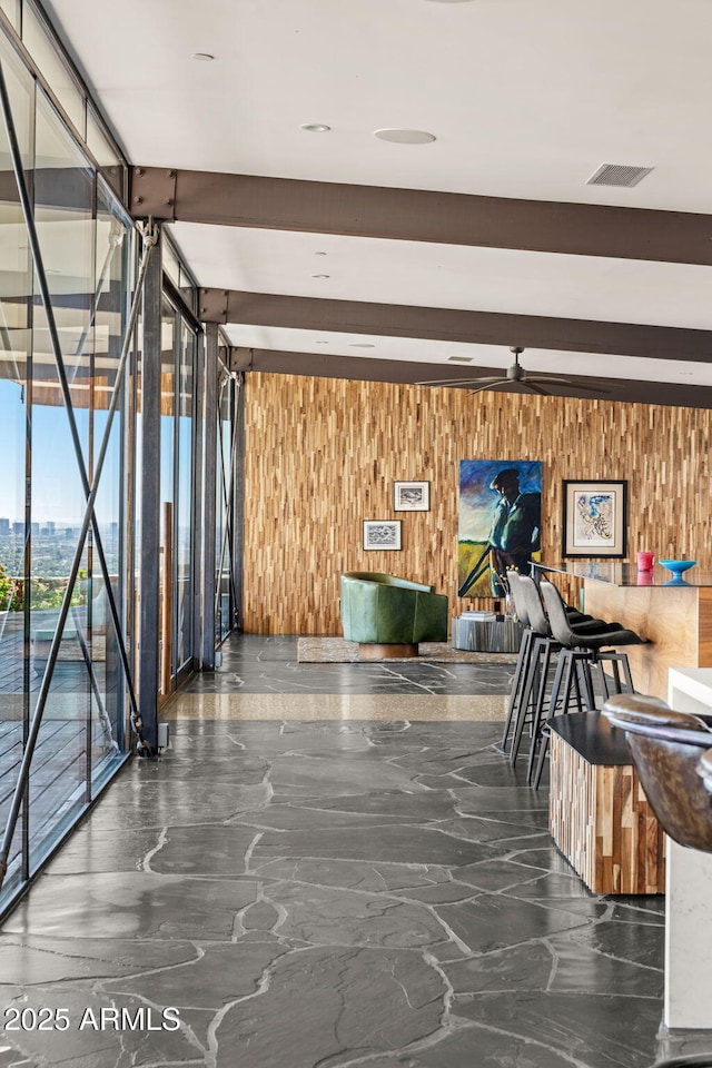 4925 E Red Rock Dr Unit 43, Phoenix, AZ 85018 - reception featuring wooden walls, a ceiling fan, and floor to ceiling windows