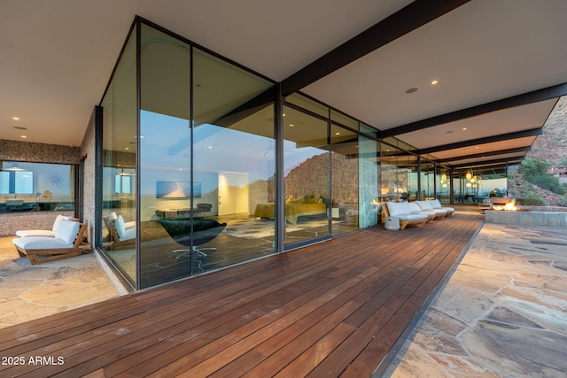4925 E Red Rock Dr Unit 43, Phoenix, AZ 85018 - wooden terrace featuring an outdoor fire pit