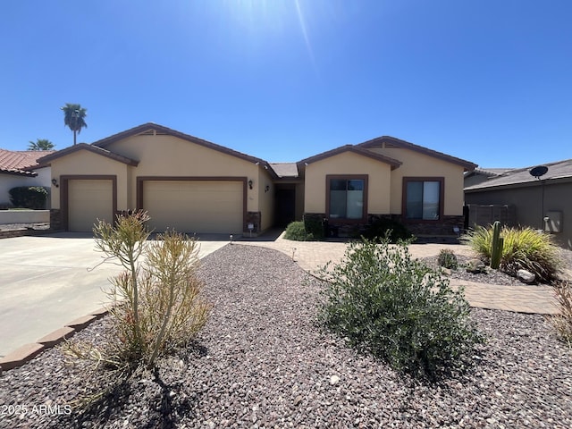 747 E Meadow Ln, Phoenix, AZ 85022 - single story home with an attached garage, stucco siding, driveway, and stone siding