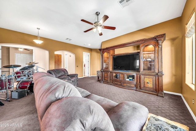 747 E Meadow Ln, Phoenix, AZ 85022 - living area featuring carpet flooring, a ceiling fan, arched walkways, and visible vents