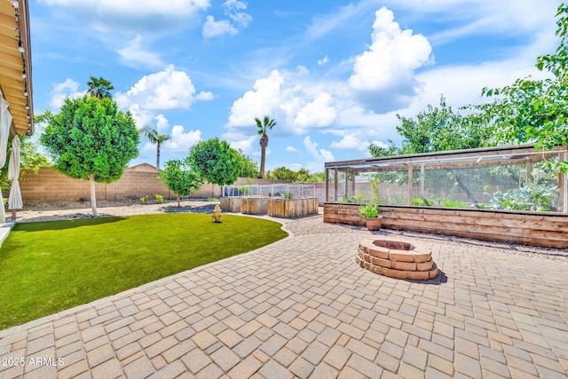 747 E Meadow Ln, Phoenix, AZ 85022 - view of patio / terrace with a fire pit and a fenced backyard