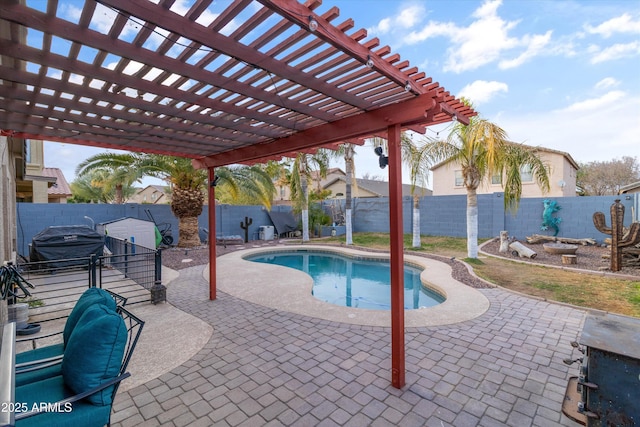 view of swimming pool with a fenced in pool, a patio, a fenced backyard, a grill, and a pergola