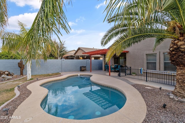 view of swimming pool with a patio area, a fenced backyard, and a fenced in pool