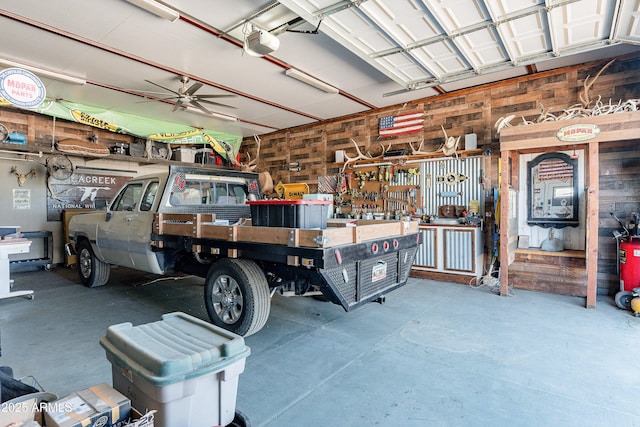 garage featuring a workshop area and a garage door opener