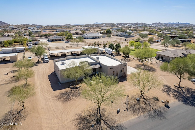 drone / aerial view with a residential view and a mountain view