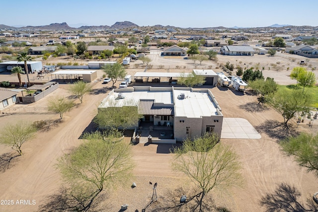 birds eye view of property with a residential view and a mountain view