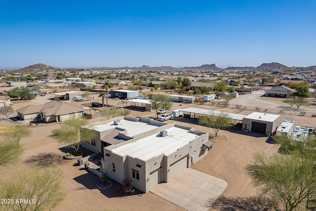 bird's eye view with a residential view and a mountain view