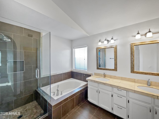 bathroom featuring lofted ceiling, vanity, plus walk in shower, and tile patterned flooring