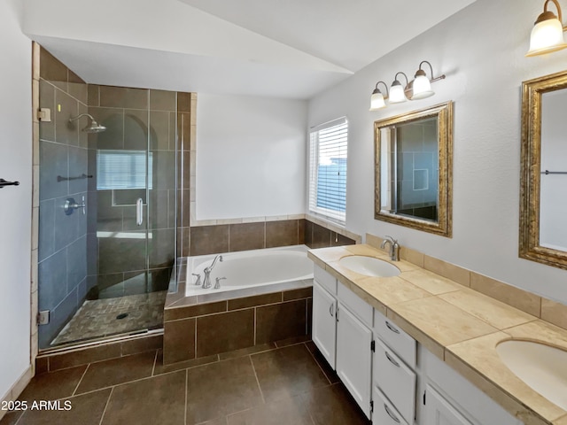 bathroom with tile patterned floors, separate shower and tub, vaulted ceiling, and vanity