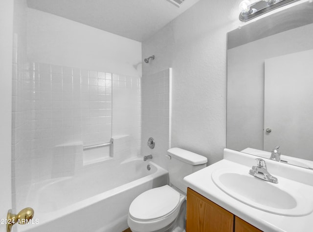 full bathroom featuring toilet, shower / bathing tub combination, and vanity