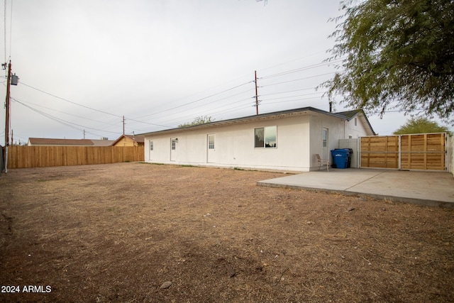 rear view of property with a patio