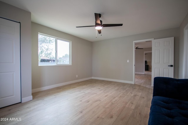 interior space featuring ceiling fan and light wood-type flooring