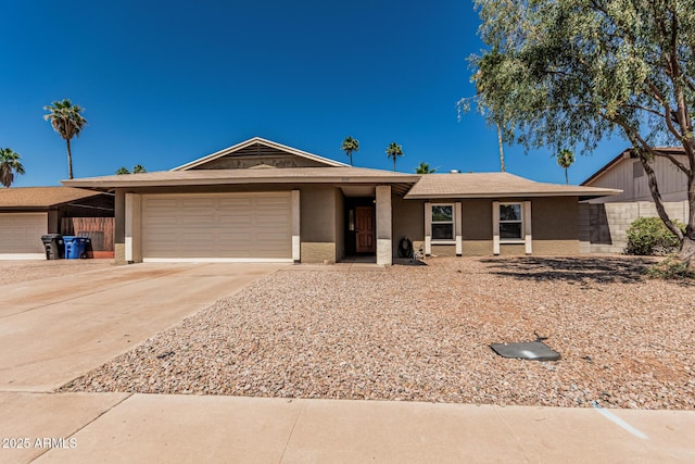 3030 S Rogers, Mesa, AZ 85202 - single story home featuring a garage, concrete driveway, and stucco siding